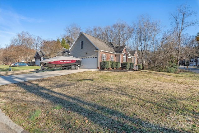 view of home's exterior featuring a lawn and a garage