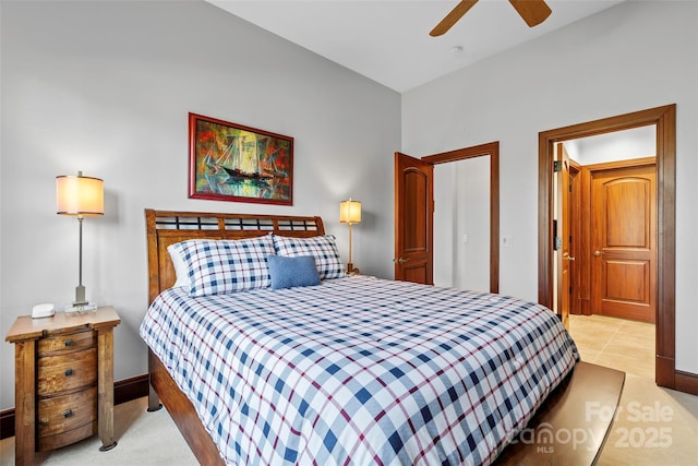 bedroom with light colored carpet and ceiling fan