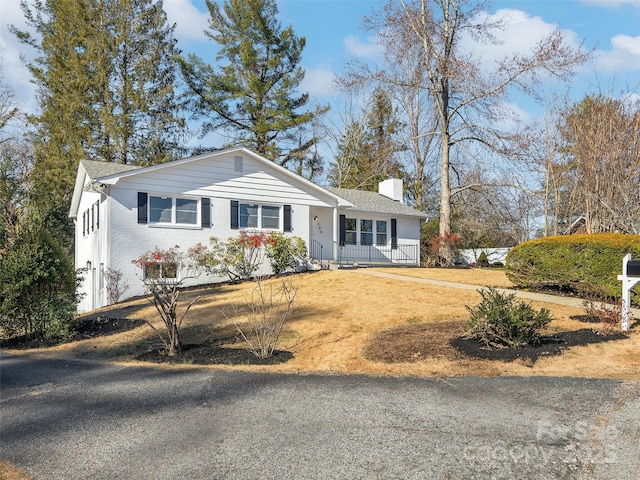 ranch-style home with covered porch