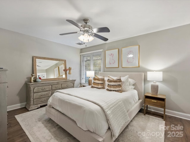 bedroom featuring hardwood / wood-style floors and ceiling fan