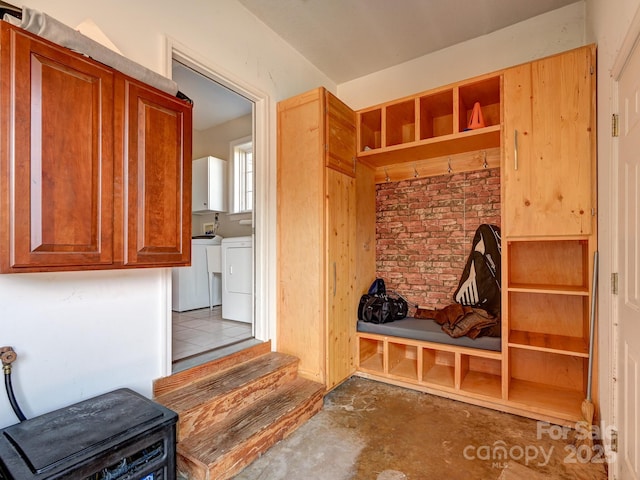 mudroom featuring washer and dryer