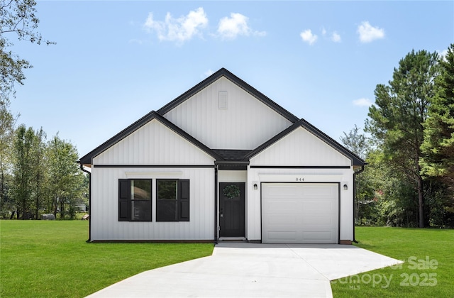 modern farmhouse style home with a garage and a front yard