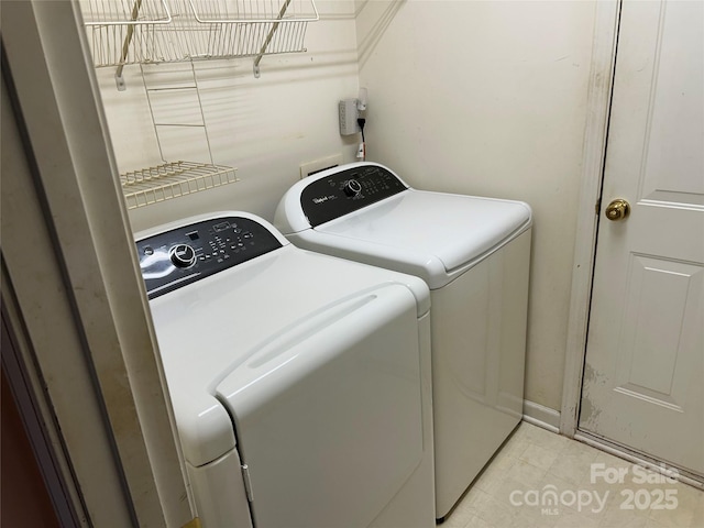 laundry area with washer and dryer