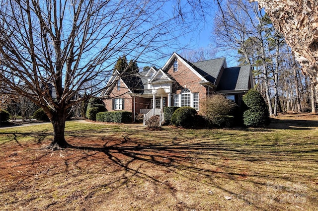 view of front of property with a front lawn