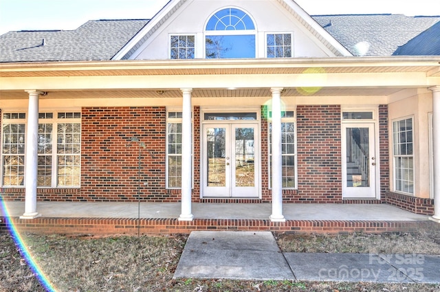 doorway to property featuring french doors