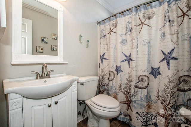 bathroom featuring vanity, toilet, ornamental molding, and walk in shower