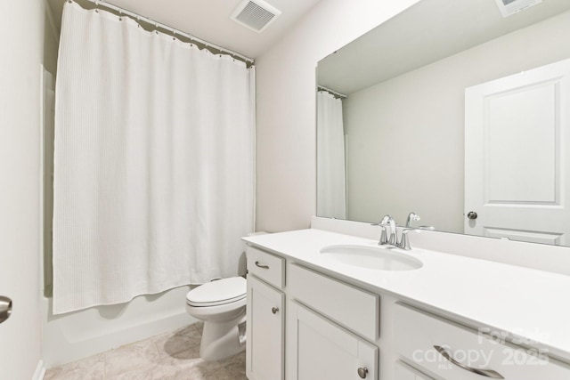 full bathroom with vanity, shower / tub combo, and toilet