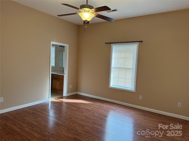 unfurnished room featuring ceiling fan and wood-type flooring