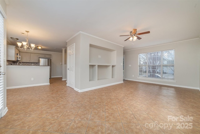 unfurnished living room featuring built in shelves, ornamental molding, and light tile patterned floors