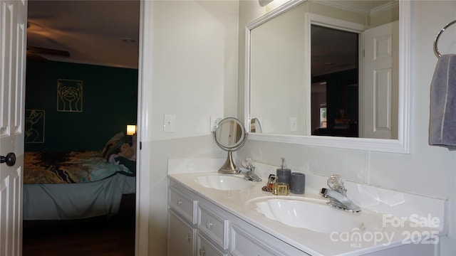 bathroom featuring vanity and ceiling fan