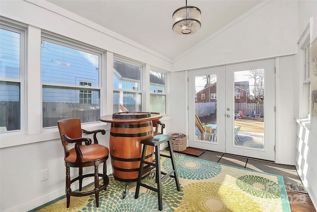 sunroom / solarium with french doors and vaulted ceiling