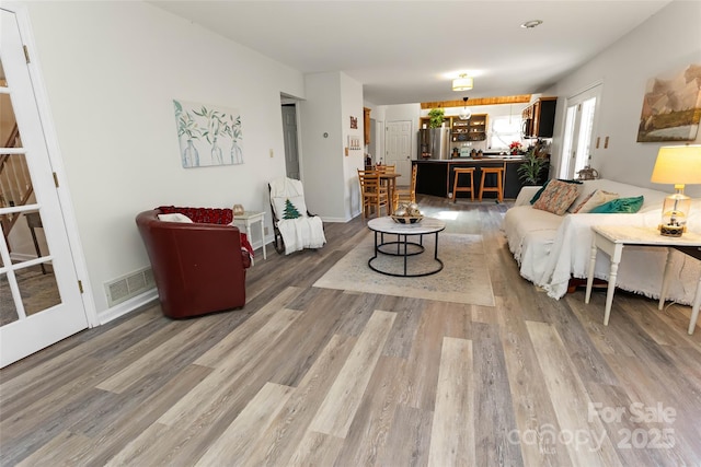 living room with hardwood / wood-style floors