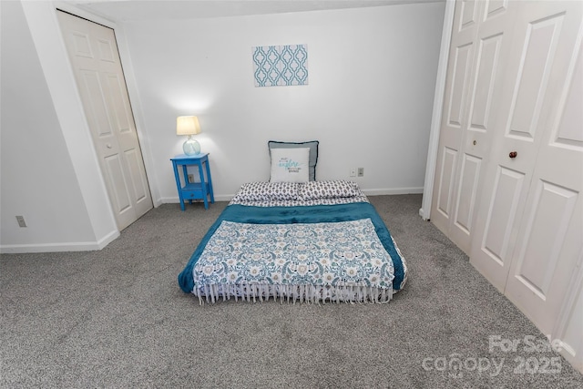 carpeted bedroom with a closet