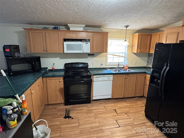 kitchen featuring sink, light hardwood / wood-style flooring, pendant lighting, a textured ceiling, and black appliances