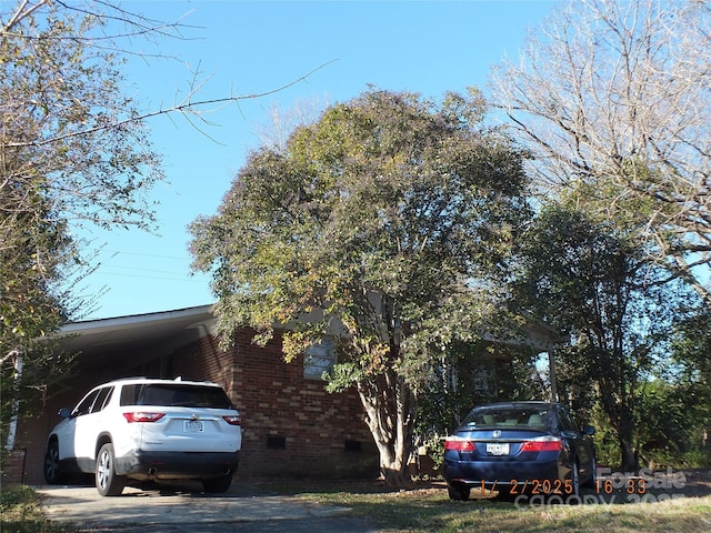 view of front of house with a carport