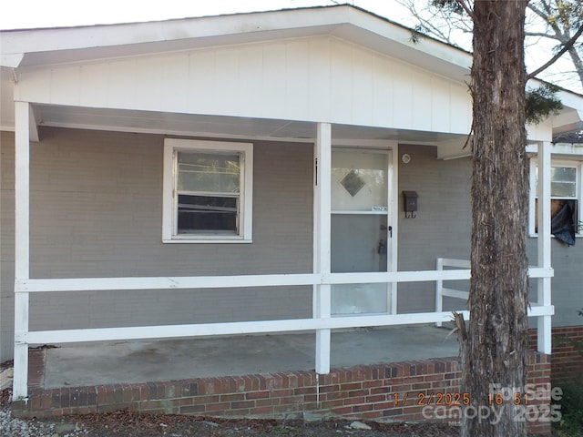 view of home's exterior featuring a porch