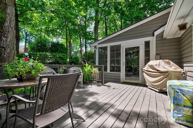 92 Heritage Dr, Clover, SC 29710 - wooden terrace featuring outdoor dining area and a sunroom