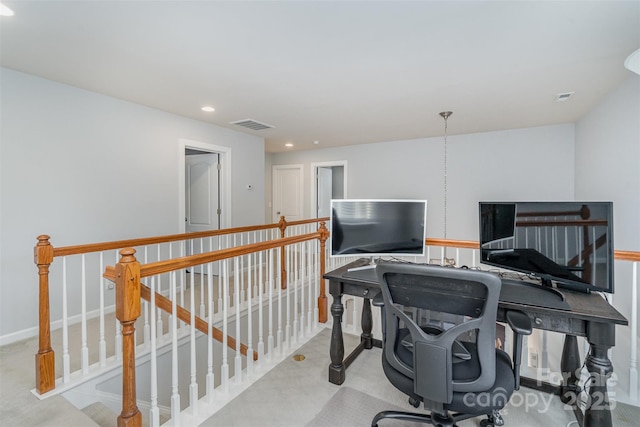 home office with light colored carpet