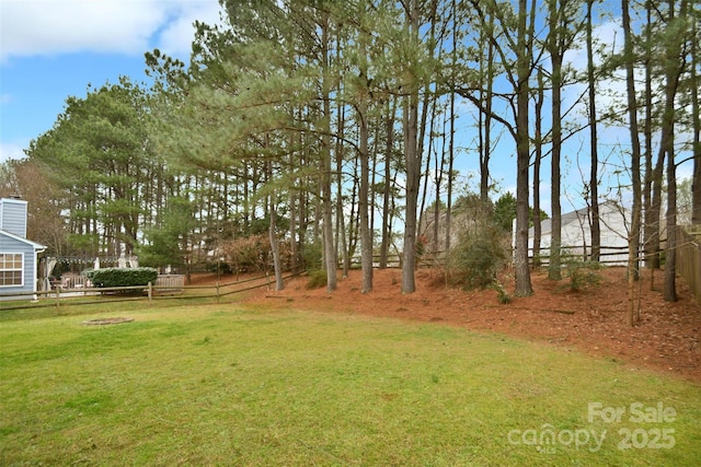 view of yard featuring fence