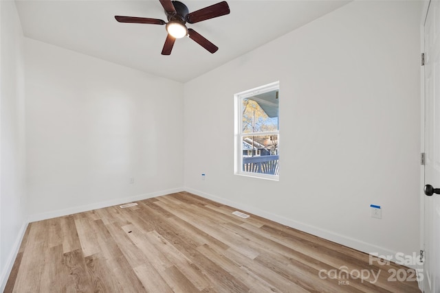 unfurnished room featuring ceiling fan and light hardwood / wood-style flooring