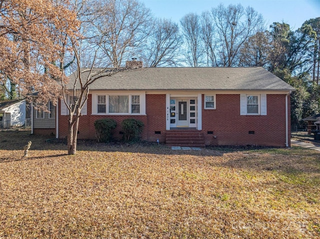 ranch-style house with a front lawn