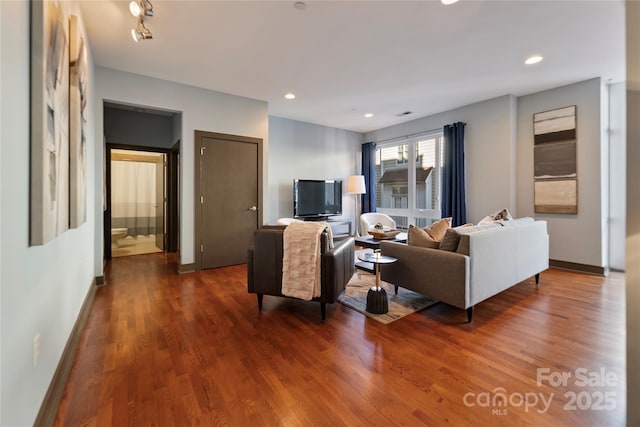 living room featuring dark hardwood / wood-style flooring