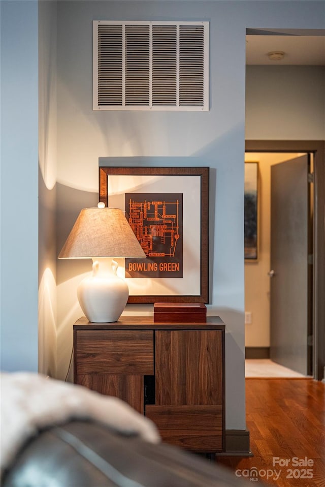 bedroom featuring hardwood / wood-style flooring