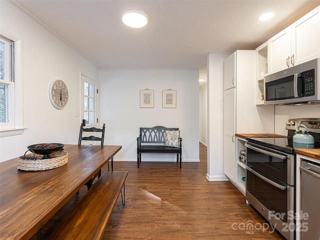 dining room with dark wood-type flooring