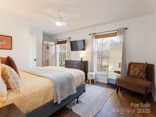 bedroom featuring ceiling fan and wood-type flooring