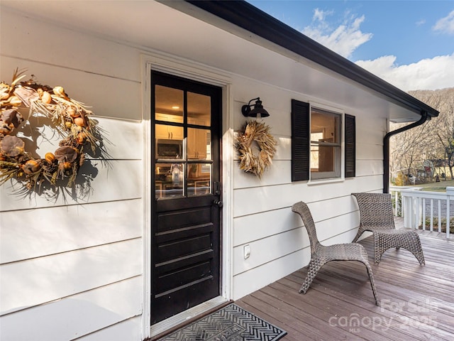 doorway to property featuring a porch