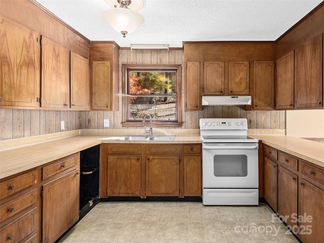 kitchen with white range with electric cooktop, sink, and a textured ceiling