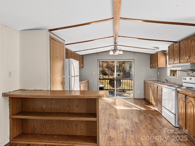 kitchen featuring sink, lofted ceiling with beams, a notable chandelier, white appliances, and hardwood / wood-style flooring