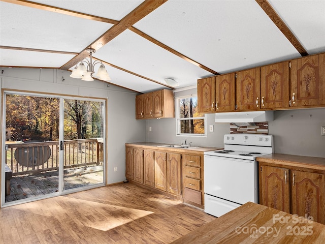 kitchen featuring white range with electric cooktop, sink, light hardwood / wood-style floors, and lofted ceiling