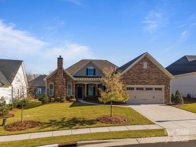 view of front of house with a garage and a front yard