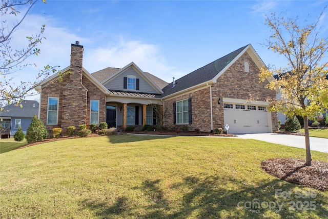 view of front of home featuring a front yard and a garage