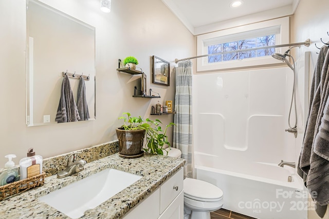 full bathroom featuring shower / tub combo with curtain, vanity, and toilet