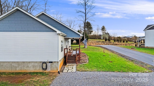 view of home's exterior featuring a lawn