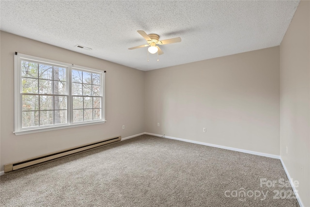 empty room featuring a ceiling fan, baseboards, carpet, visible vents, and a baseboard radiator