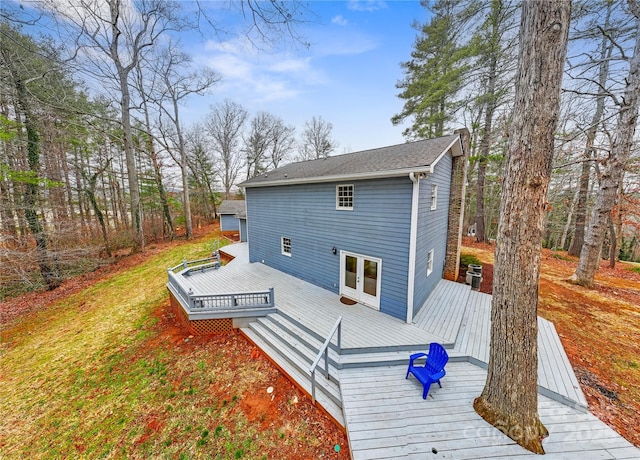 back of property with a wooden deck and central AC unit