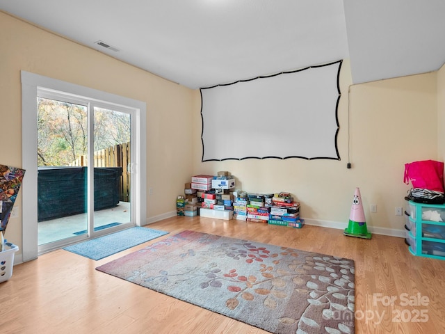 recreation room featuring hardwood / wood-style flooring