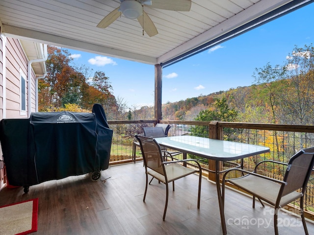 view of patio / terrace with a grill, ceiling fan, and a wooden deck