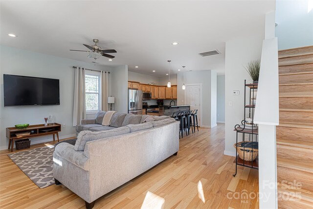 7 Pineview Rd, Fairview, NC 28730 - living area with light wood-style flooring, a ceiling fan, stairs, recessed lighting, and baseboards