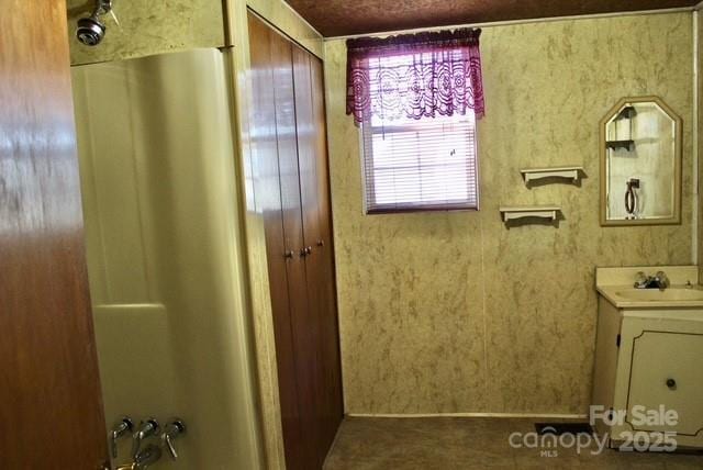 bathroom with vanity and shower / bath combination