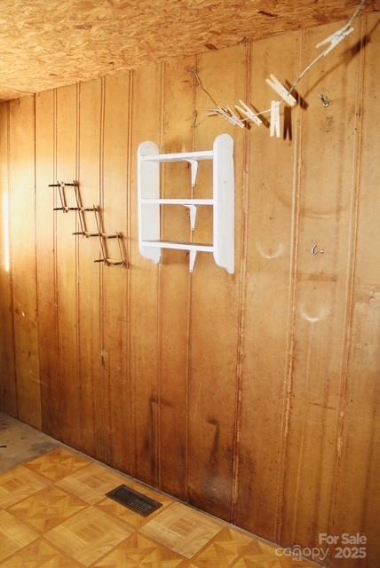 room details featuring wood walls