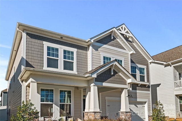 craftsman-style house featuring a garage