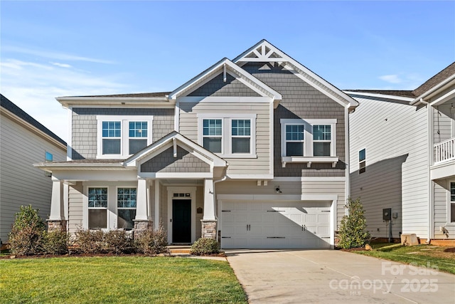 craftsman-style house with a garage and a front yard