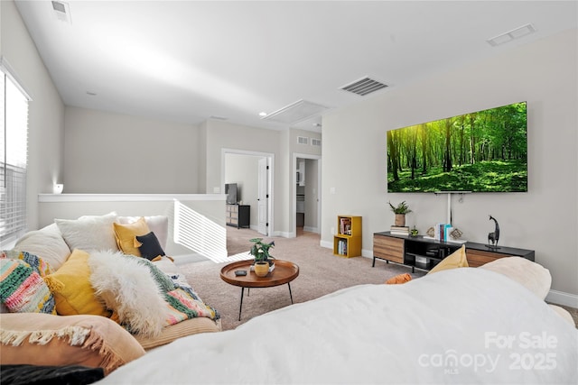 bedroom featuring light carpet