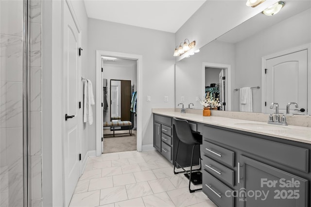 bathroom with vanity and an enclosed shower