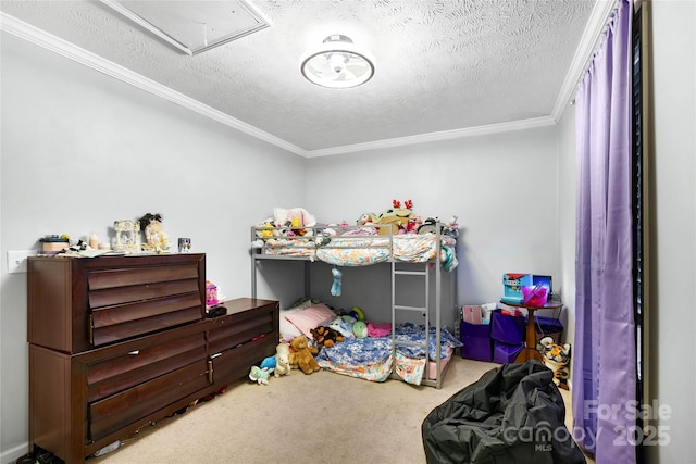 bedroom with carpet floors, a textured ceiling, and ornamental molding