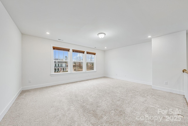 empty room featuring carpet floors